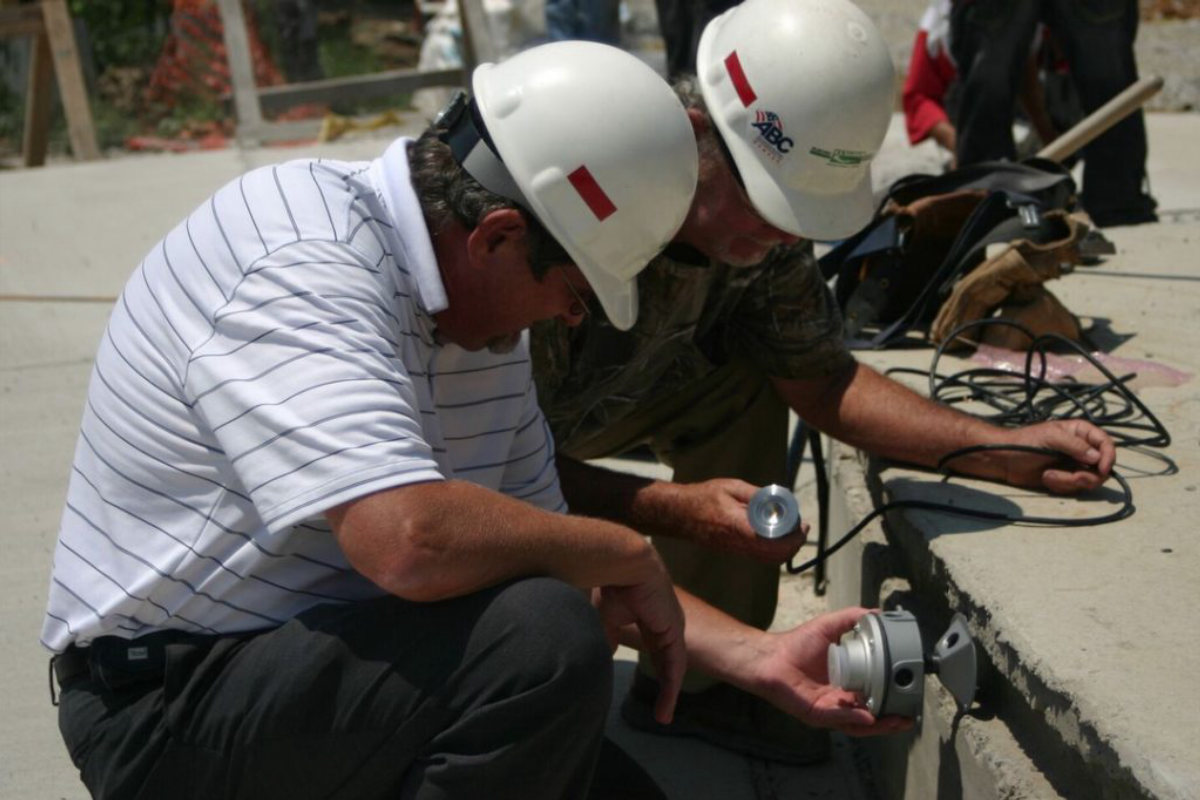 Amprite crew terminating site lighting conductors at Nashville Riverfront Play Park