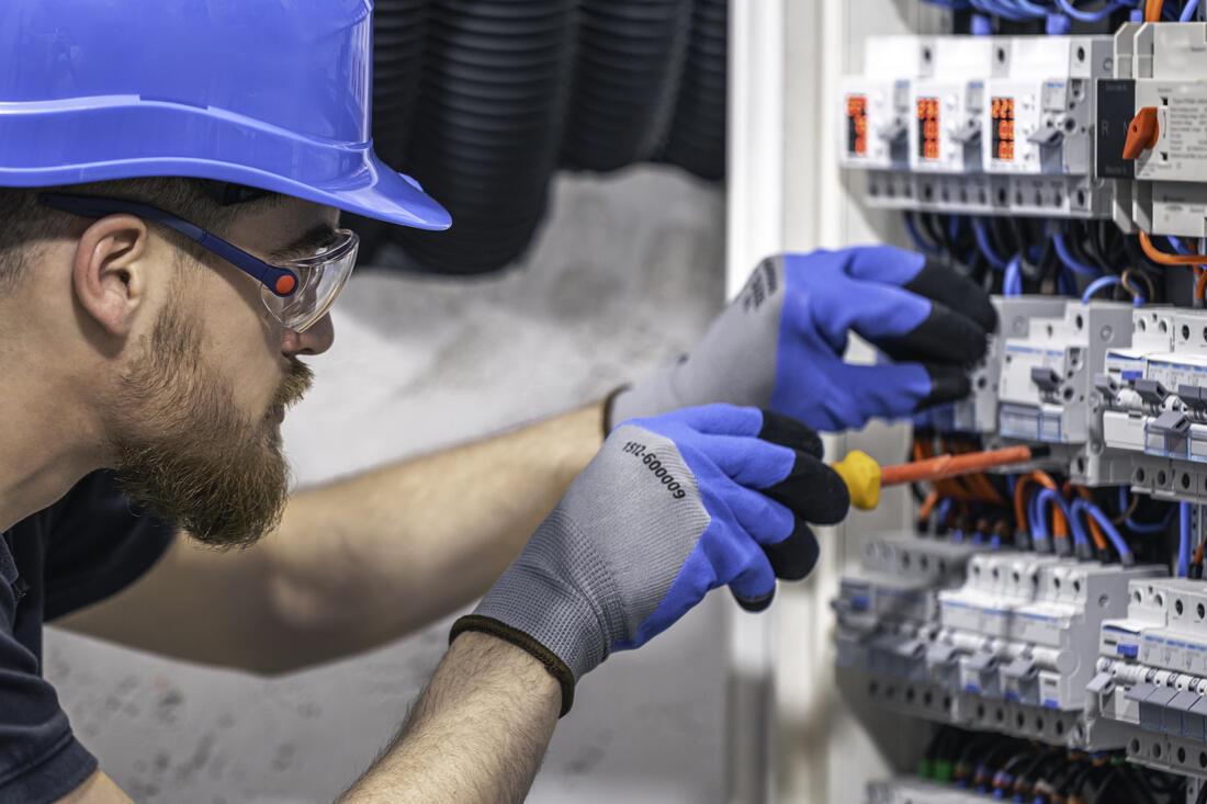 Amprite electrician performing a commercial electrical repair