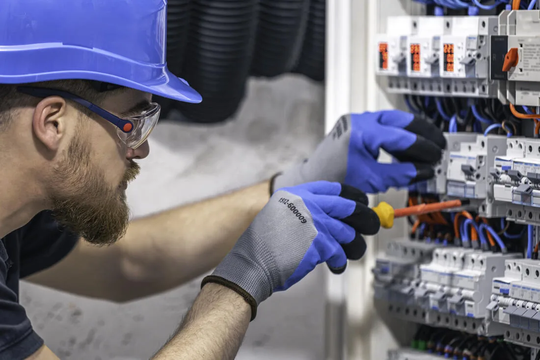 Amprite electrician performing an electrical repair